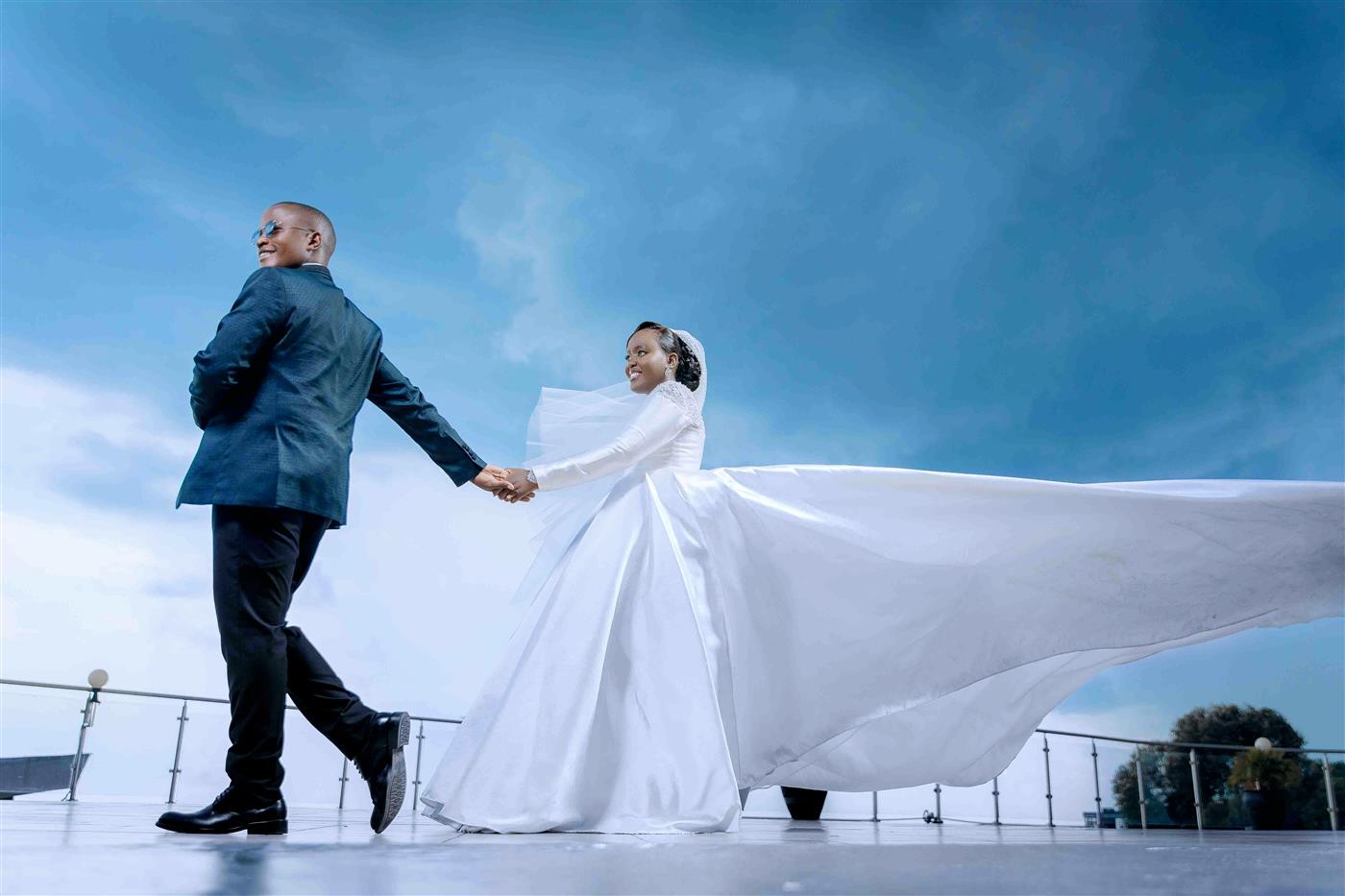 Wedding couple photographed by First Class Media